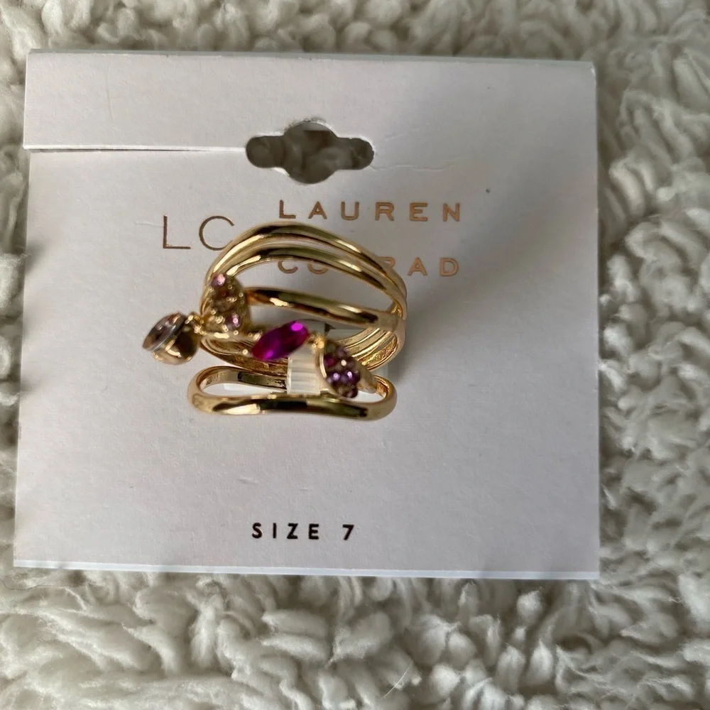 NWT LC Lauren Conrad Rose Gold Tone
Clear Simulated Stones & Wavy Bands Ring Set - Picture 2 of 4